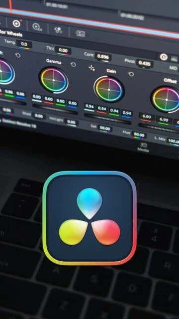 DaVinci Resolve color grading interface with wheels. Logo on keyboard.
